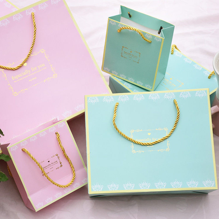 Elegant Decorative Paper Bags , UV Coating Paper Grocery Bags With Handles