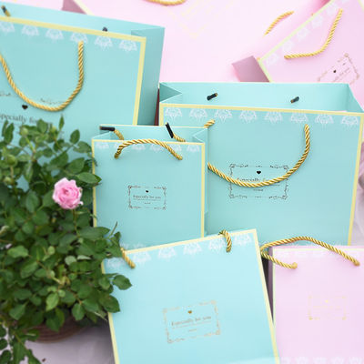 Elegant Decorative Paper Bags , UV Coating Paper Grocery Bags With Handles